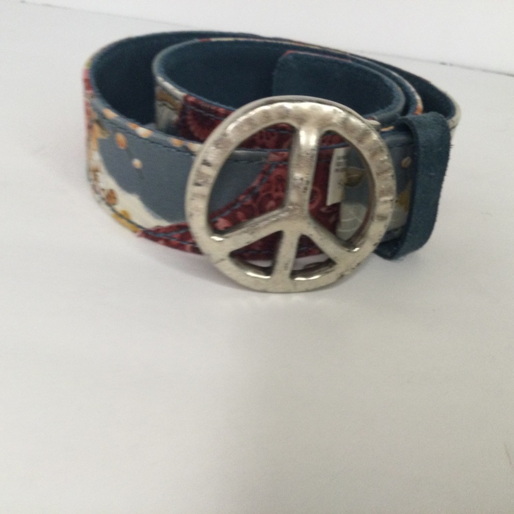 Ladies belt Size S in length. Substantial Peace Sign buckle. Genuine leather.